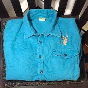 Soft heathered vintage teal shirt with deer patch